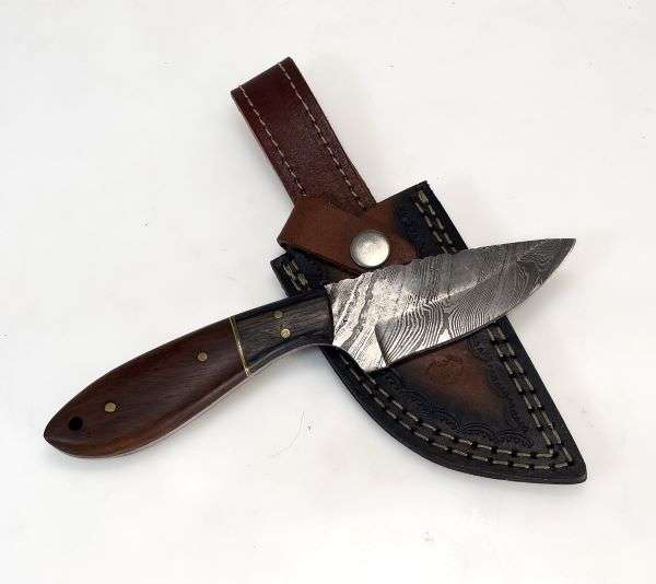 Walnut and blue Laminate handle on Damascus steel blade